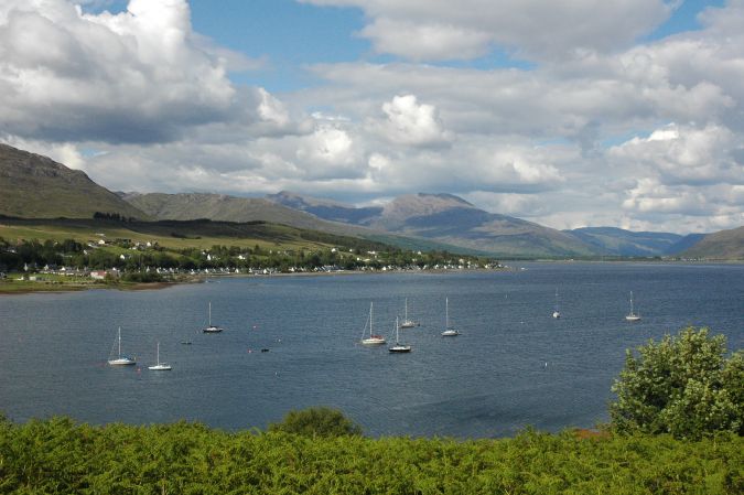 A panoramic view of Loch Carron and Lochcarron village as seen from the top of Slumbay Island